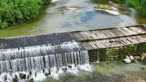 Aerial-Drone-Above-Wide-Waterfall-Savinja-River-Landscape,-Logar-Valley-Slovenia-Natural-Forest-Park