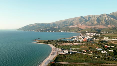Albania,-beach-by-the-blue-Ionian-Sea,-aerial-view-from-a-drone