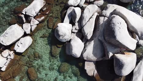 Drone-Circling-A-Beautiful-White-Boulder-Cove-In-North-Lake-Tahoe,-Nevada