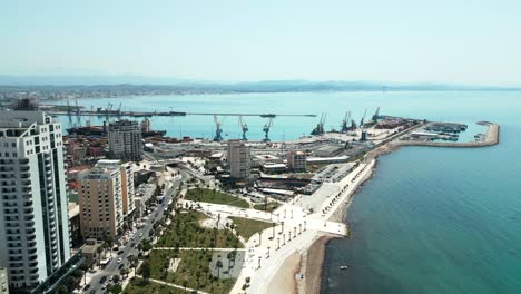 Durres,-city-buildings,-port-by-the-Adriatic-Sea,-aerial-view-from-a-drone