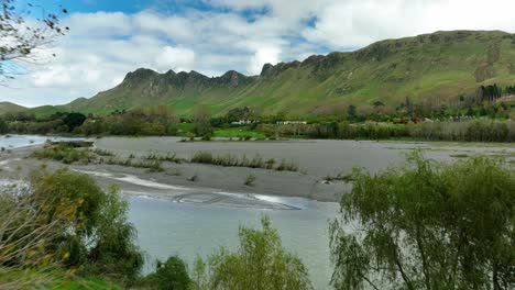 Tukituki-fresh-water-river-flowing-through-natural-riverbed-in-New-Zealand