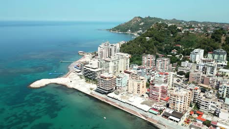 Durres,-promenade,-city-buildings,-and-Adriatic-Sea-beach,-aerial-view-from-a-drone