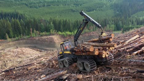 Challenging-Terrain:-Aerial-View-of-Forwarder-Loading-Logs