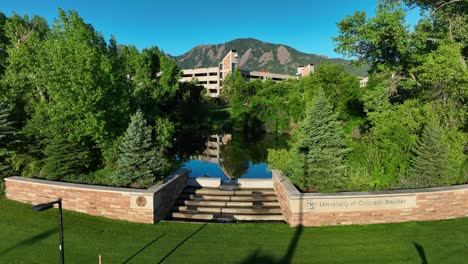 University-of-Colorado-Boulder-sign-at-campus-pond