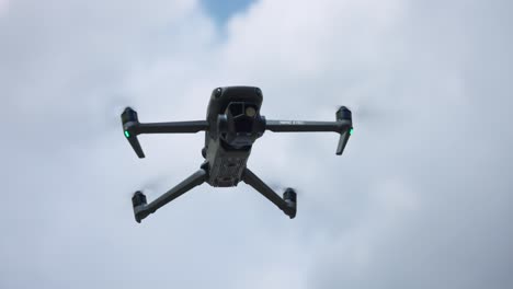 Low-angle-view-of-Mavic-quadcopter-drone-in-static-flight