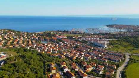 Aerial-drone-4K-drone-footage-capturing-the-enchanting-coastal-town-of-Izola,-Slovenia