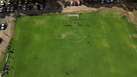 Aerial-top-down-shot-of-corner-and-missed-goal-during-amateur-soccer-game-in-Australia-at-summer