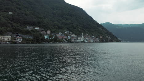 Aerial-approach-of-Brienno-village-from-Como-lake-in-Italy