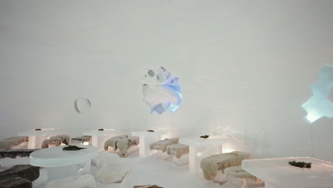 Slow-motion-of-icy-lounge-bar-inside-the-famous-snow-hotel-in-kirkenes,-Norway---above-the-arctic-circle