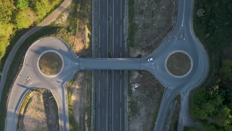 Aerial-View-Cars-Driving-On-Double-Roundabouts-In-Italy