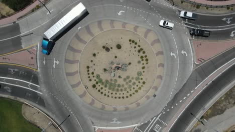 Aerial-View-of-Roundabout,-Slow-Ascending-Shot