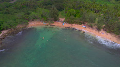 Aerial-view-of-Hale'iwa-beach-on-Oahu-Hawaii-with-surfers