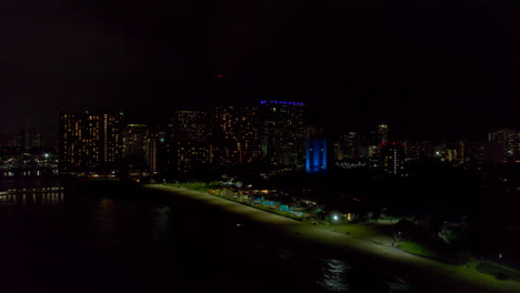 Aerial-reveal-of-Honolulu-at-night.-4k-drone