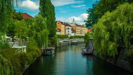 Captivating-Ljubljana-timelapse:-Charming-cityscape-on-Ljubljanica-river-canal-in-historic-old-town