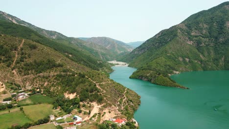 Albania,-the-Accursed-Mountains-and-Lake-Koman,-aerial-view-from-a-drone