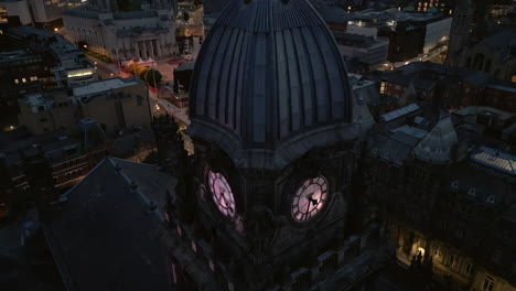 Closeup-Rotating-Drone-Shot-Around-Leeds-Town-Hall-at-Night-in-Leeds-City-Centre