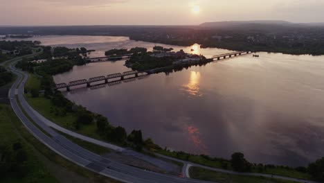 Cinematic-aerial-footage-of-the-ZIBI-community-in-Ottawa,-Capital-City-of-Canada-at-sunset,-Drone
