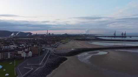 Cinematic-Aerial-View-of-Port-Talbot-with-Steelworks-on-Horizon