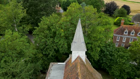A-push-in-shot-towards-All-Saints-church-steeple-in-West-Stourmouth