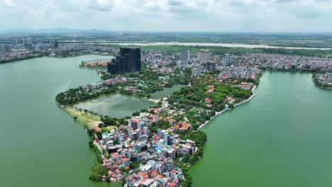 Cinematic-aerial-footage-of-Tay-Ho-Lake-and-Quang-An-district-in-Hanoi