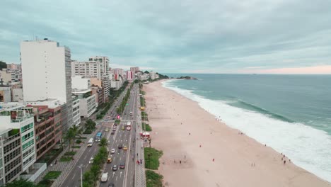 Bird's-eye-view-establishing-of-Ipanema-beach-in-Rio-de-Janeiro-Brazil,-cloudy-day