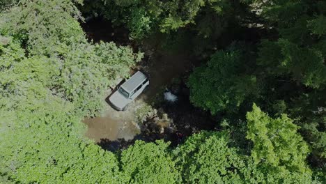 driving-ford-bronco-on-ballast-in-the-forest,-4x4,-off-road