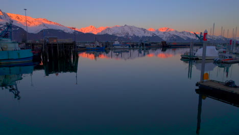 Seward-Alaska-Boat-Harbor-with-view-of-mountains-at-sunset