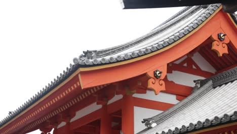 Close-up-of-the-red-imperial-palace-roof-in-Kyoto-Japan