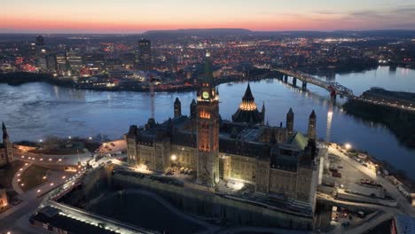 A-striking-evening-drone-shot-of-the-Parliament-buildings-with-Gatineau-in-the-background