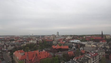 An-aerial-shot-of-a-historic-city-with-overcast-skies-in-Poland