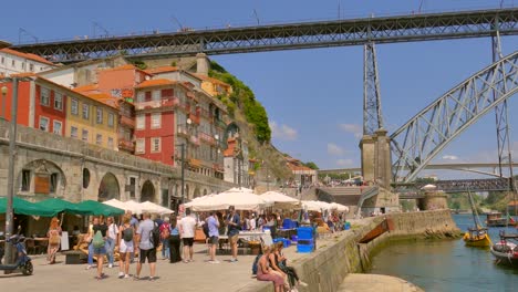 Historical-Area-Of-Porto,-Ribeira-District-With-View-Of-Dom-Luis-I-Bridge-In-Portugal---panning
