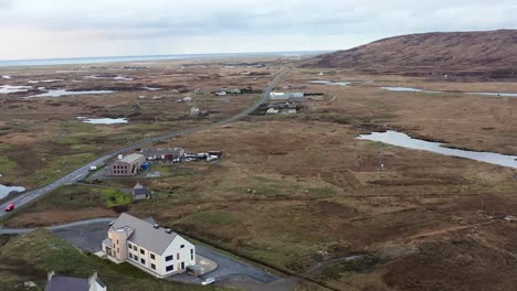 Drone-shot-of-the-village-of-Daliburgh-near-Lochboisdale-in-South-Uist