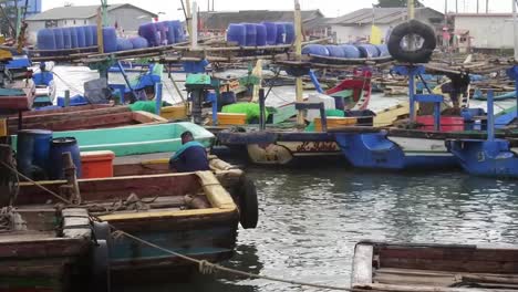 Fishermens-activities-at-the-fish-trading-wharf-in-Pelabuhan-Ratu,-Sukabumi-Regency,-West-Java,-Indonesia