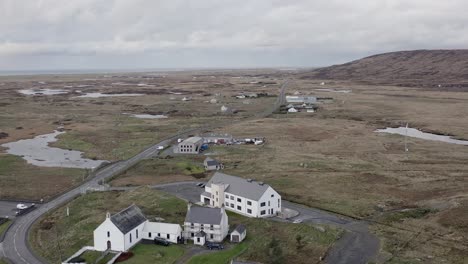 Counter-clockwise-moving-shot-looking-North-of-the-Cnoc-Soilleir-building-in-the-village-of-Daliburgh-in-South-Uist