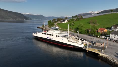 Norled-modern-electric-ferry-named-Dragsvik-is-alongside-in-Sognefjorden-Norway-during-summer-day