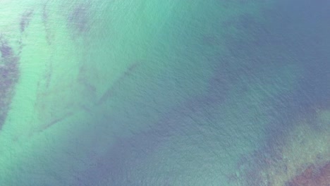 aerial-view-of-blue-green-ocean,-4k