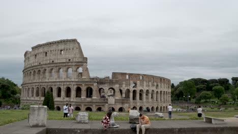 Iconic-Colosseum-Viewed-From-Piazza-di-Santa-Francesca-Romana-On-Overcast-Cloudy-Day