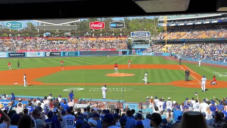 Dodger-crowd-celebrates-a-home-run-by-Will-Smith,-Dodgers-baseball-Stadium-in-Los-Angeles