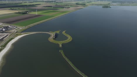 Side-panning-shot-of-Tulip-Island-Aerial-Drone-View-In-Zeewolde,-aerial