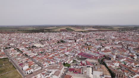 Establishing-aerial-of-charming-town-center-in-inland-Spain,-Montijo,-Badajoz