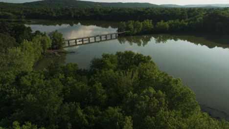 Aerial-View-Of-Lake-Sequoyah-Drive-Spanning-Across-Lake-Sequoyah-In-Fayetteville,-Arkansas