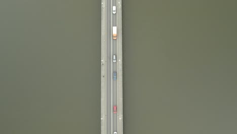 Top-View-Of-A-Traffic-Moving-Slowly-On-The-Bridge-In-Wexford-City,-Ireland