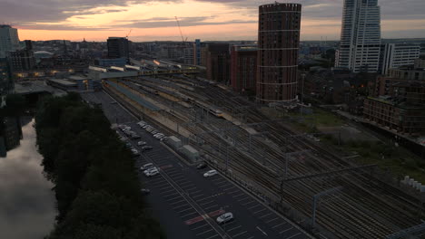 Establishing-Drone-Shot-Over-Leeds-Train-Station-at-Sunrise