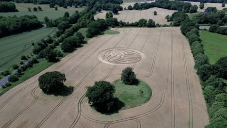 Establishing-aerial-view-towards-Warminster-2023-crop-circle-farmland-alongside-A36-highway