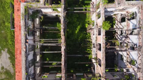 Aerial-Birds-Eye-View-Over-Abandoned-Derelict-Shih-Chung-Branch-School-In-Penang,-Malaysia