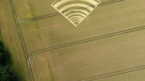 Micheldever,-Hampshire-crop-circle-aerial-view-looking-down-over-mysterious-geometric-wheat-field-artwork,-England-2023