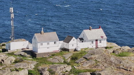 Stavernsodden-Small-Lighthouse-Stands-On-Rocky-Coastal-Sea-Of-Larvik-In-Norway