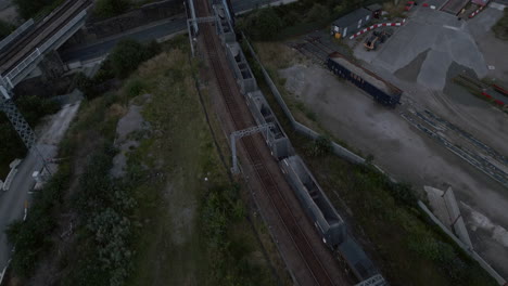 Drone-Shot-of-Empty-Freight-Train-Waiting-Outside-Leeds-Train-Station