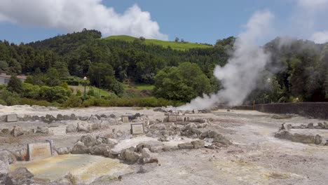 Active-Geysers-at-natural-landmark-"Caldeiras-das-Furnas"-in-Furnas,-San-Miguel-Island,-Azores,-Portugal-on-a-sunny-summer-day---Slow-Motion