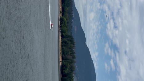 A-seaplane-taking-off-from-Vancouver-Harbour,-British-Columbia-Canada---vertical-orientation